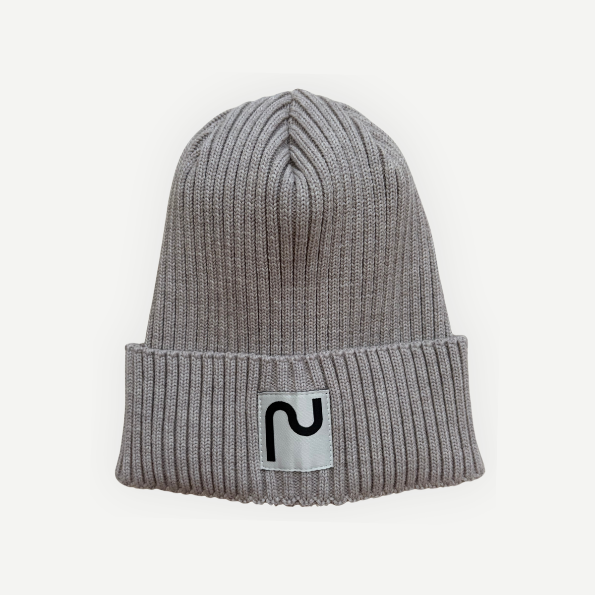 Tuque 100% laine de mérinos couleur écru, fabriqué à Montréal au Canada. 