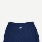 Détail de la taille haute du legging en laine mérinos Périple pour femme, couleur marine.